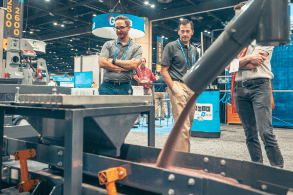 B5200_Attendees Looking at Oscillating Conveyor (2) (1) B5200_Attendees Looking at Oscillating Conveyor (2) (1)