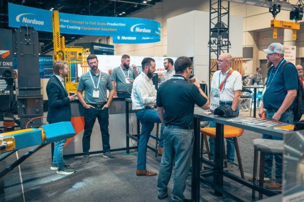 B5200_B1 Crew Talking To Attendees at B1 Container Booth (1) B5200_B1 Crew Talking To Attendees at B1 Container Booth (1)