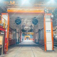 Combination wash and paint booth designed for high-volume industrial manufacturing